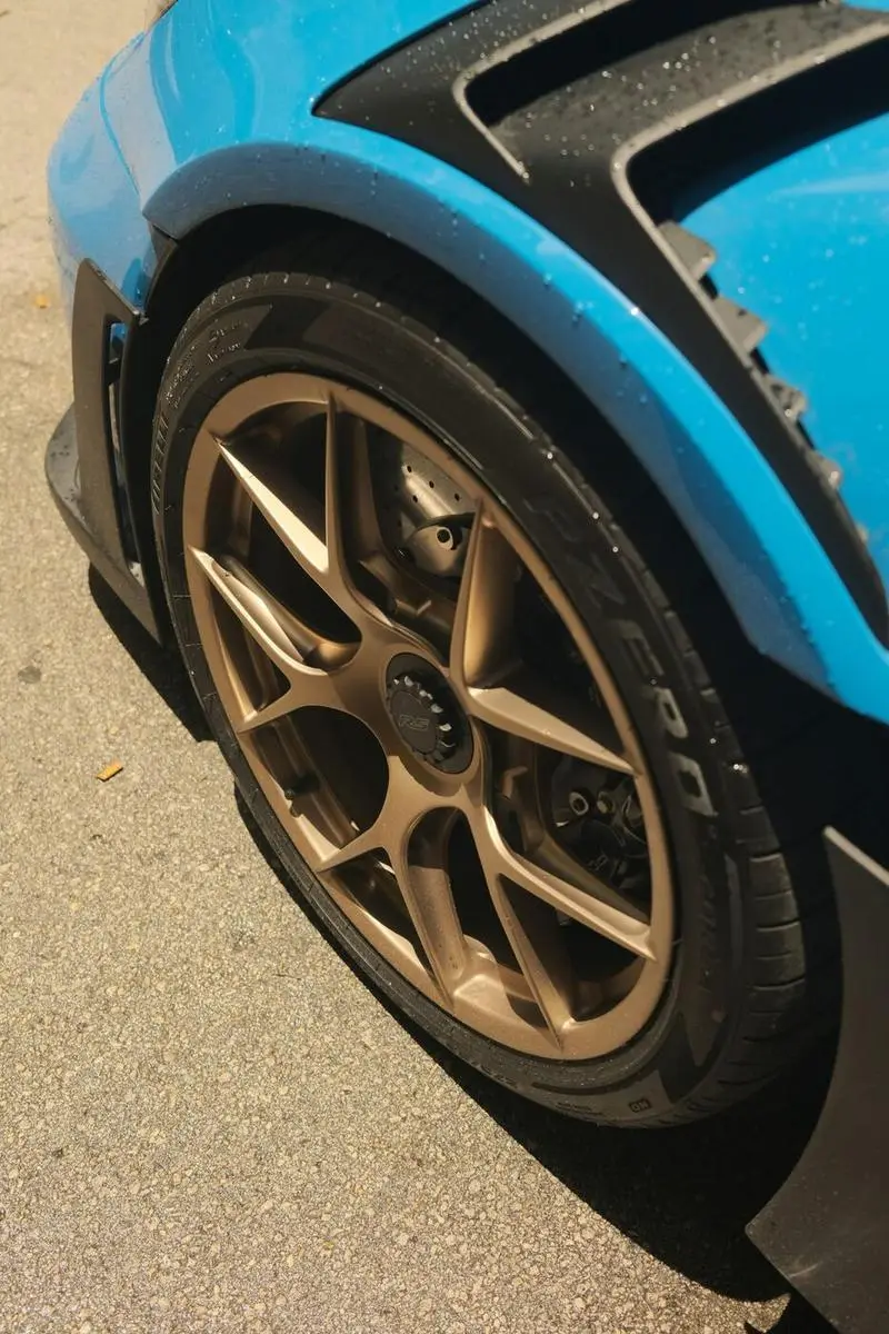 Freshly refurbished alloy wheel on a car repaired by Quick Fix Auto