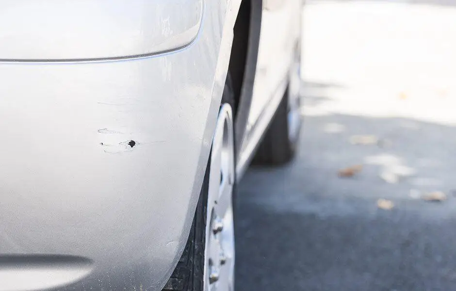Stone chips across a car bonnet before a mobile chip repair
